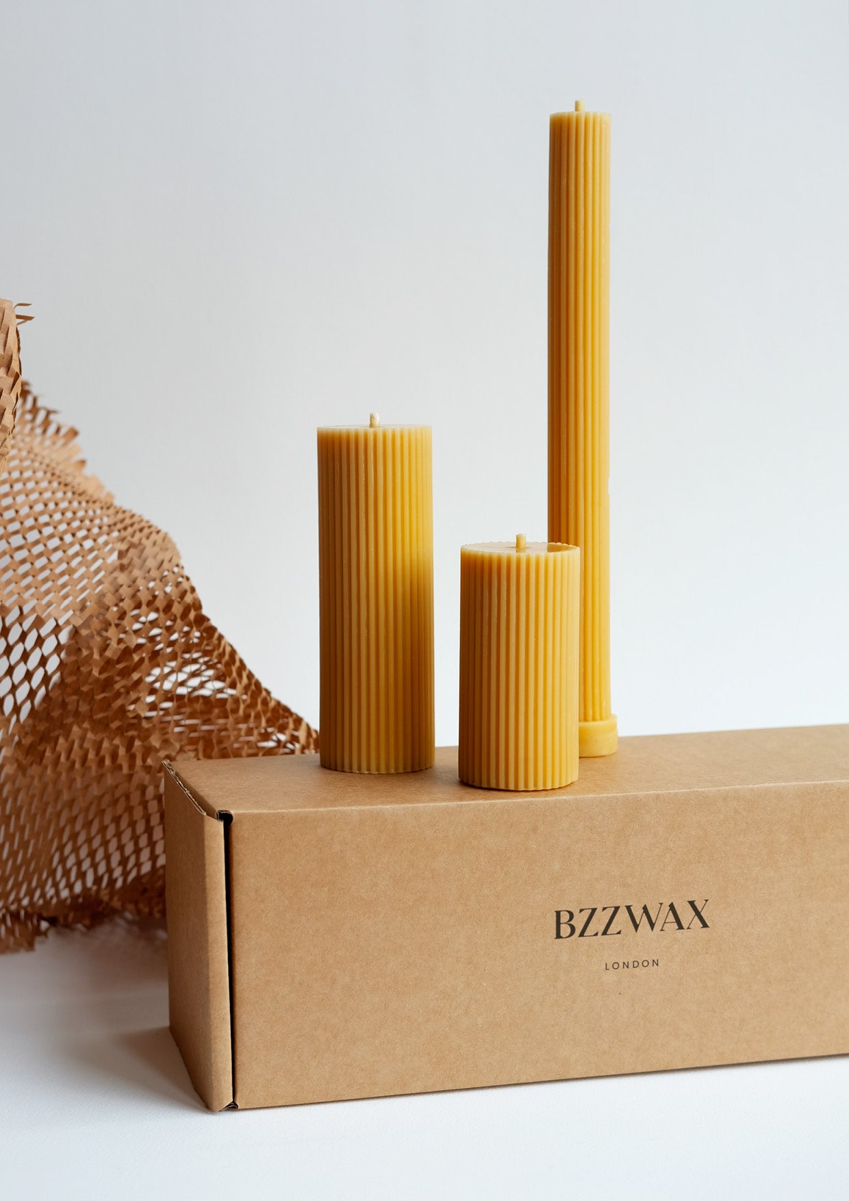 beeswax candles and sustainable packaging